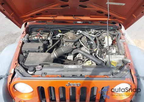 2011 Jeep Wrangler Sport z USA, uszkodzony, nr VIN 1J4AA2D10BL520310